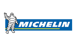 A michelin logo with a person climbing up the side of it.